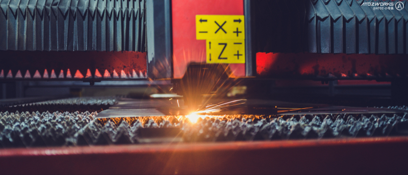 Laser cutting flat sheet metal